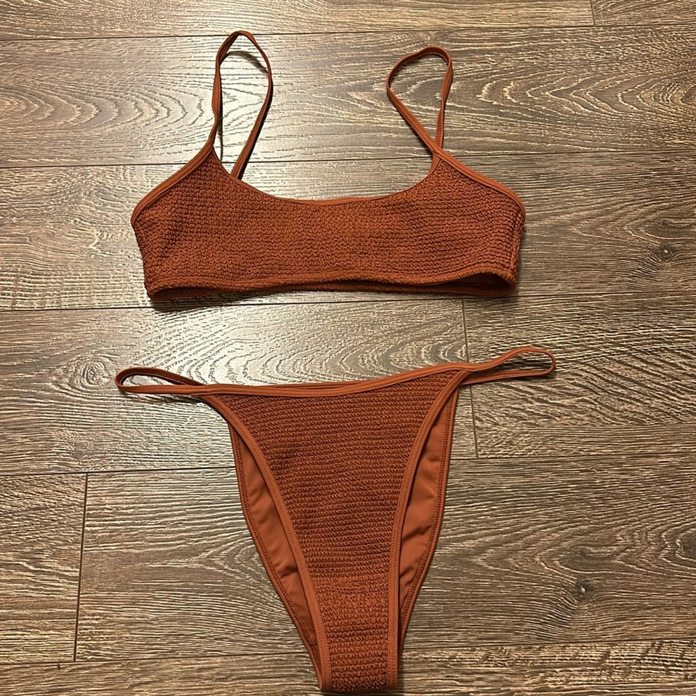 PacSun LA hearts swim size medium. Rust color. Like new!